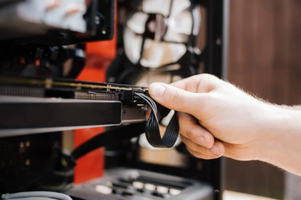 man fixing cables