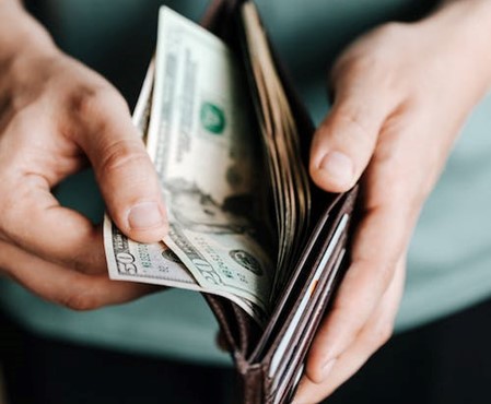 wallet with dollars