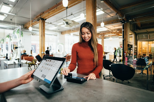 lady paying with credit card