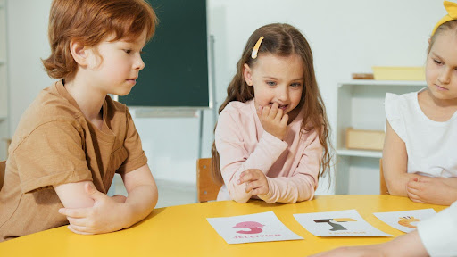 three children at school