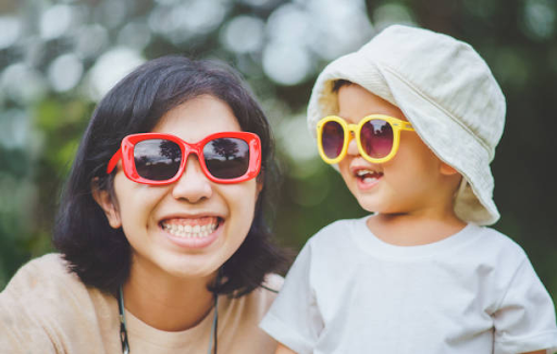 two children wearing sunglasses