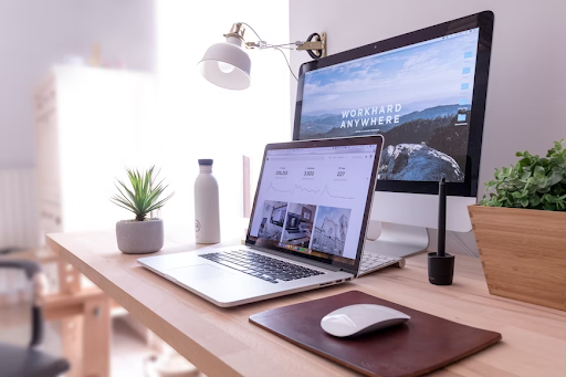 laptop in front of computer