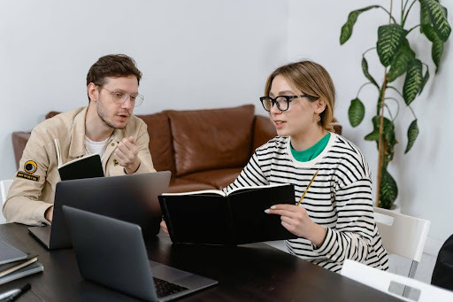 man and woman working
