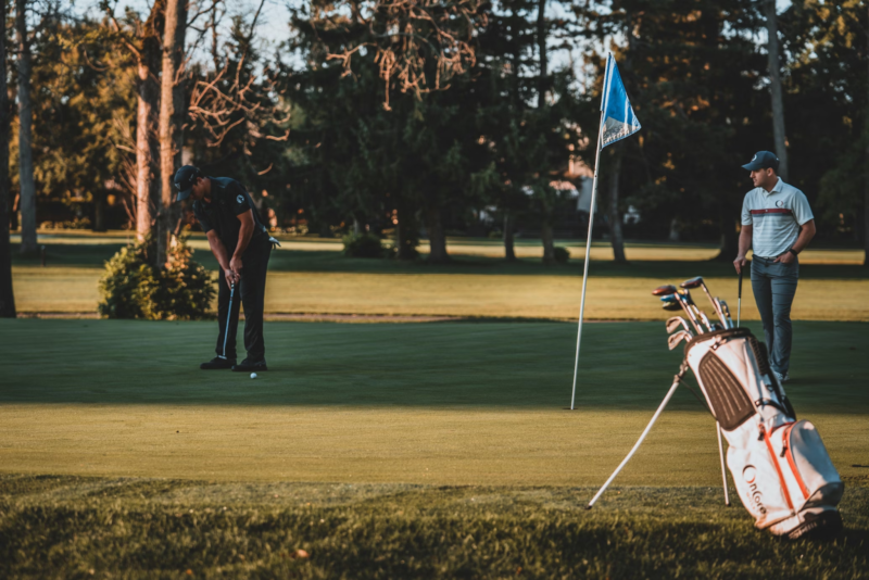 men playing golf