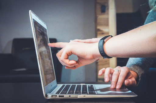 person using laptop computer