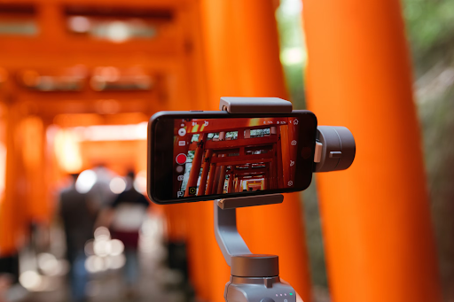 phone on stand taking photo