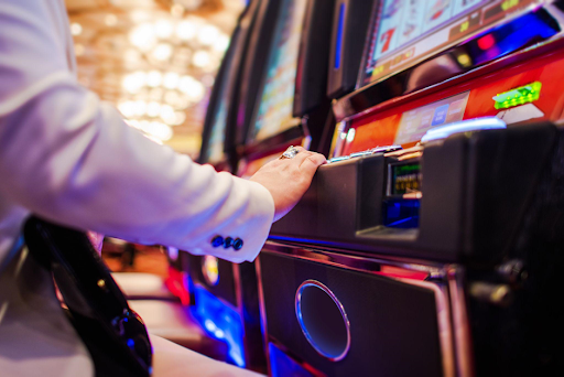 woman playing slot machine