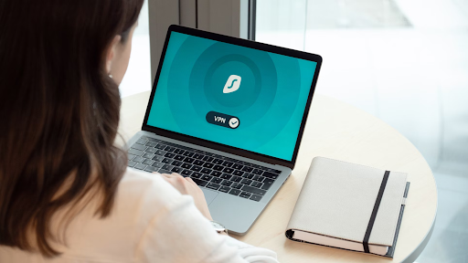 lady with vpn open on laptop