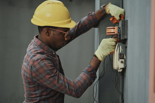 man working on electrics