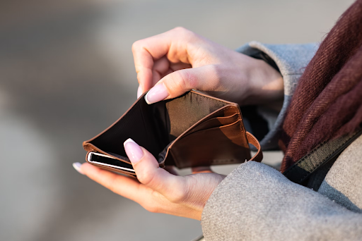 woman with empty wallet