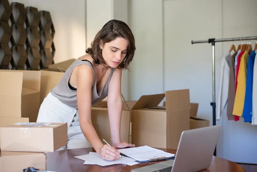 Lady noting inventory