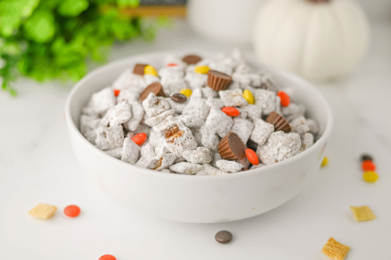 Easy Reese’s Pieces Muddy Buddies You’ll Want to Munch All Day