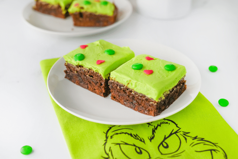 Easy Grinch Brownies with Green Frosting and Heart Sprinkles